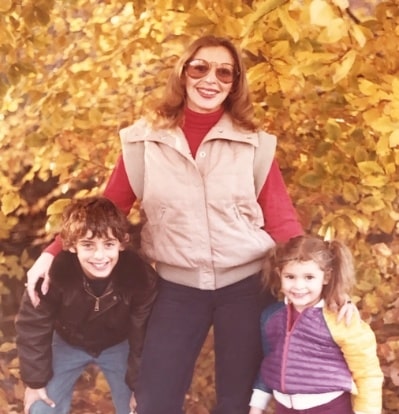 cool mom wearing sunglasses with her kids