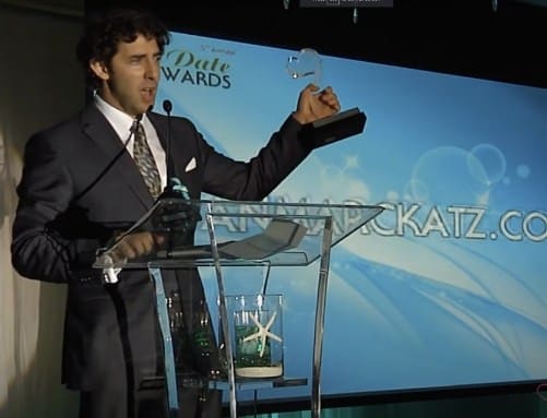 Evan Marc Katz receiving an award