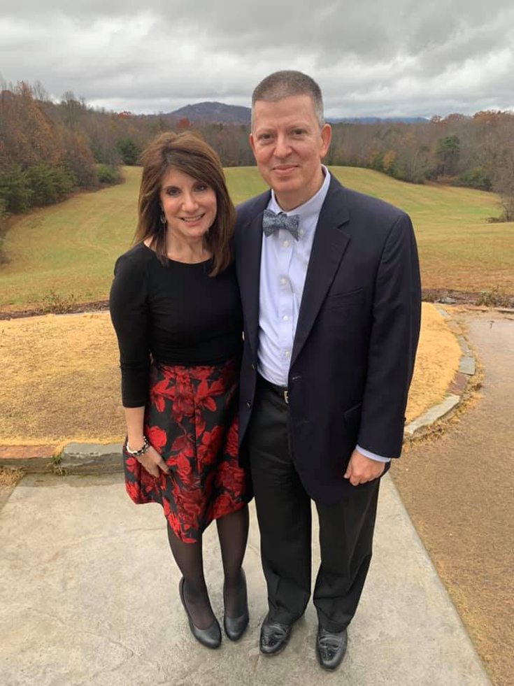 middle-aged couple in a golf course