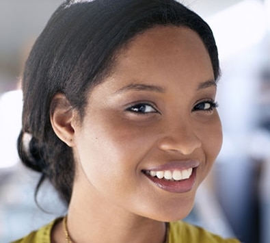 Smart strong successful woman with black hair smiling