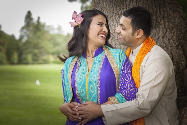 happy newly married couple gazing at each