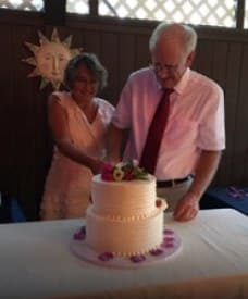 Love U success story of older newly married couple slicing a cake