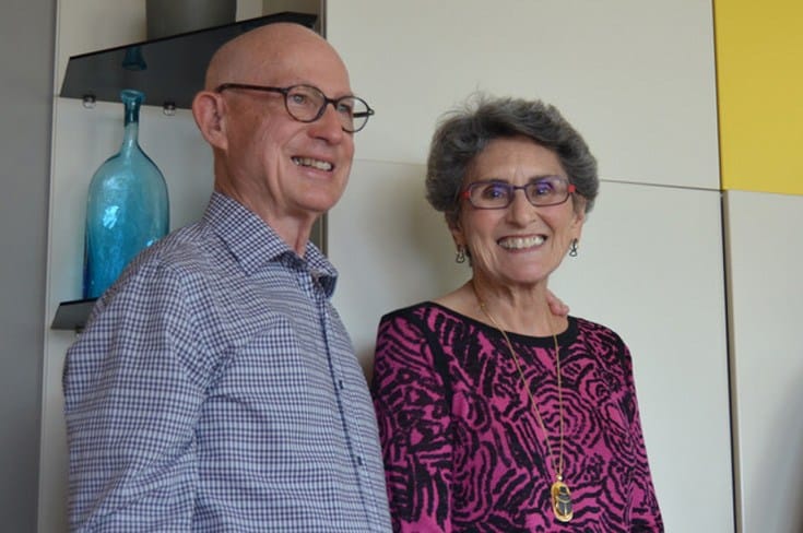 lovely older couple wearing glasses