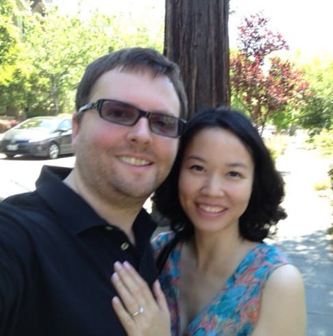 happy sucessful, strong, smart woman happily showing off her engagement ring with future husband