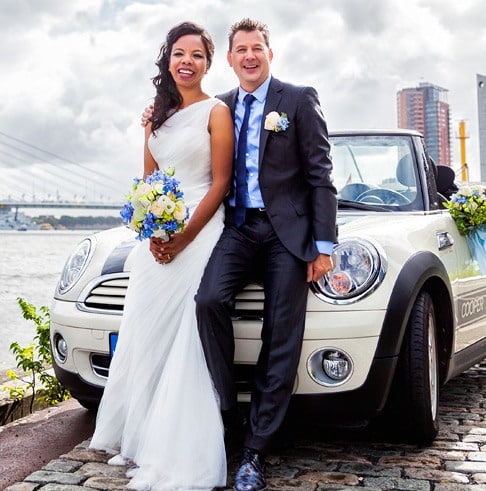 beautiful bride holding white and blue flowers getting married to her one true love - Love U love story